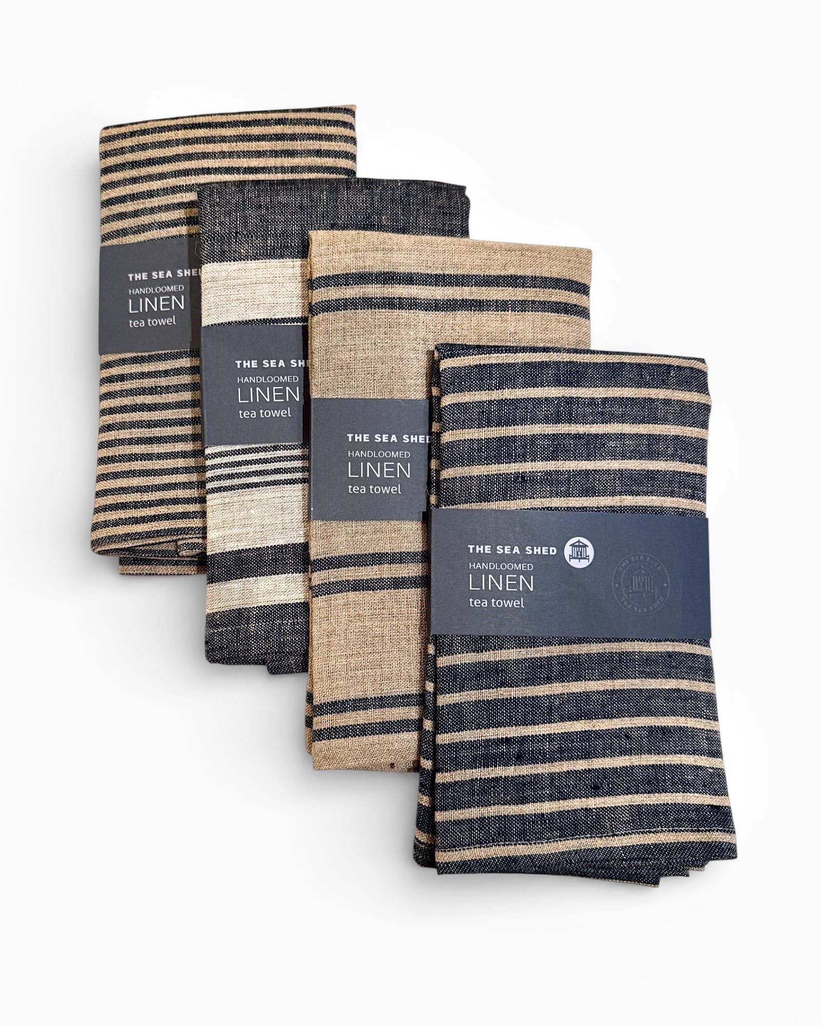 Set of striped linen tea towels with labels on a white background
Striped linen tea towel
100% linen tea towel
Hand-loomed linen tea towel
Natural linen kitchen towel
Coastal linen tea towel
Linen dish towel UK