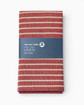 Red and beige striped linen tea towel with a blue label on a white background.Striped linen tea towel
100% linen tea towel
Hand-loomed linen tea towel
Natural linen kitchen towel
Coastal linen tea towel
Linen dish towel UK