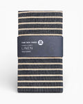 Striped linen tea towel with 'The Sea Ship' label on a white background.Striped linen tea towel
100% linen tea towel
Hand-loomed linen tea towel
Natural linen kitchen towel
Coastal linen tea towel
Linen dish towel UK